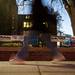 A pedestrian walks by campaign signs near the Michigan Union along State St. on Tuesday. Daniel Brenner I AnnArbor.com